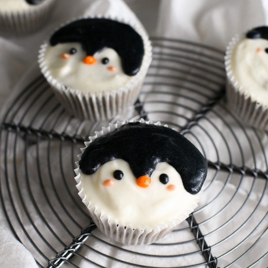 Black sesame Oreo cupcakes with penguin design