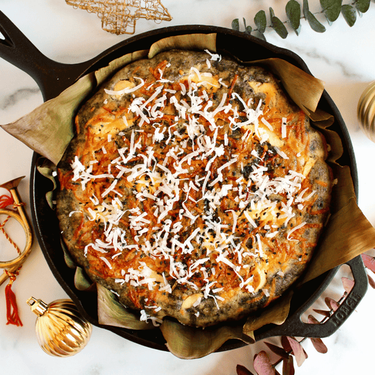 Black sesame bibingka rice cake in a pan