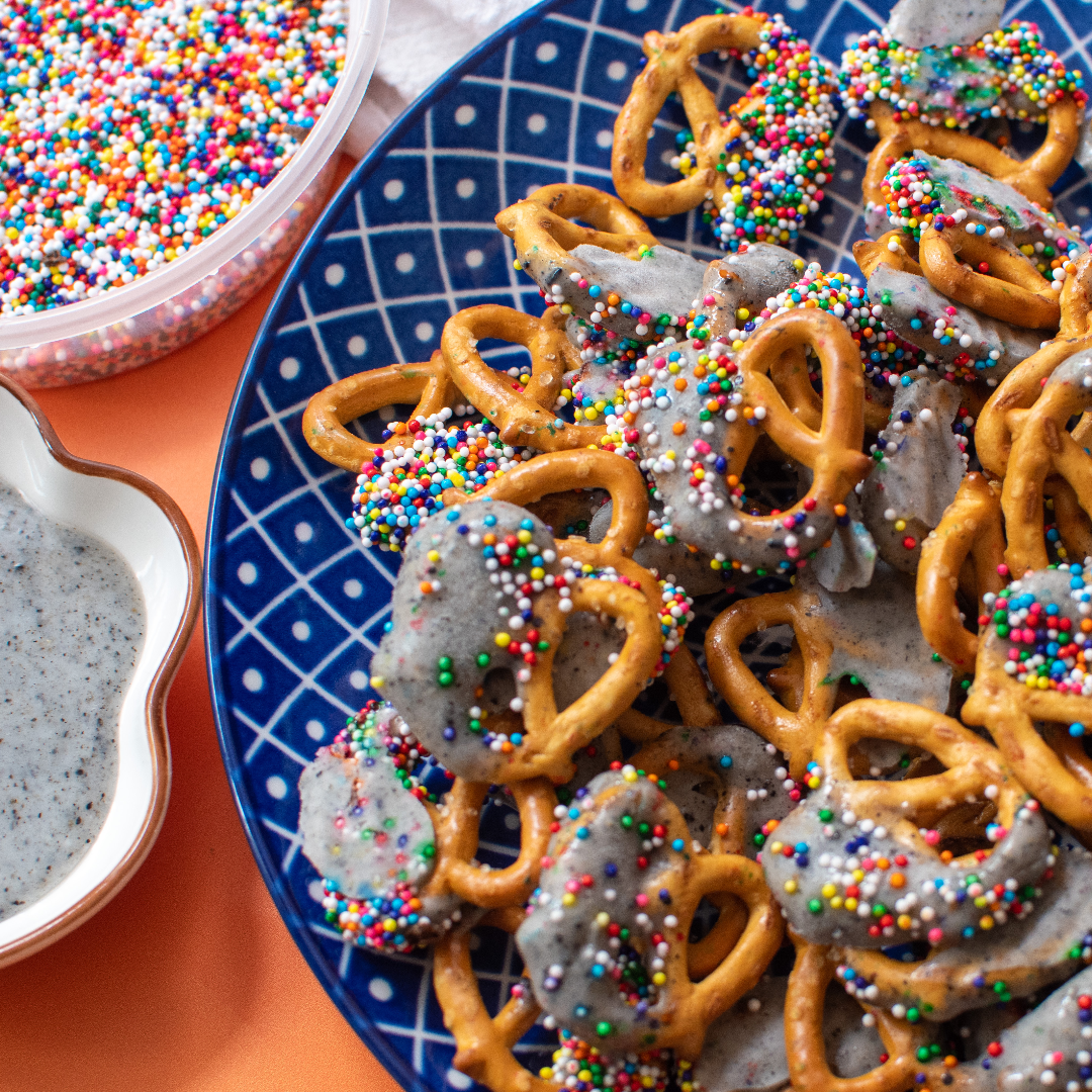 Yogurt Pretzels with rainbow sprinkles in a bowl. 